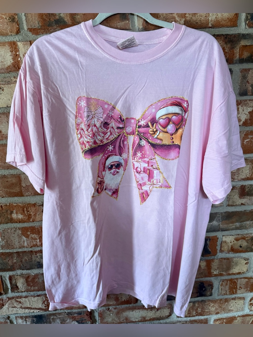 Comfort Colors Light Pink Kids Short-Sleeve Tee with Holiday Bow Graphic